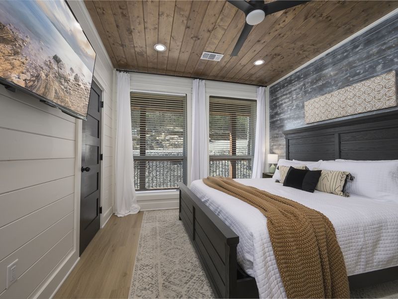 Sleep peacefully under vaulted ceilings with soft, ambient lighting.