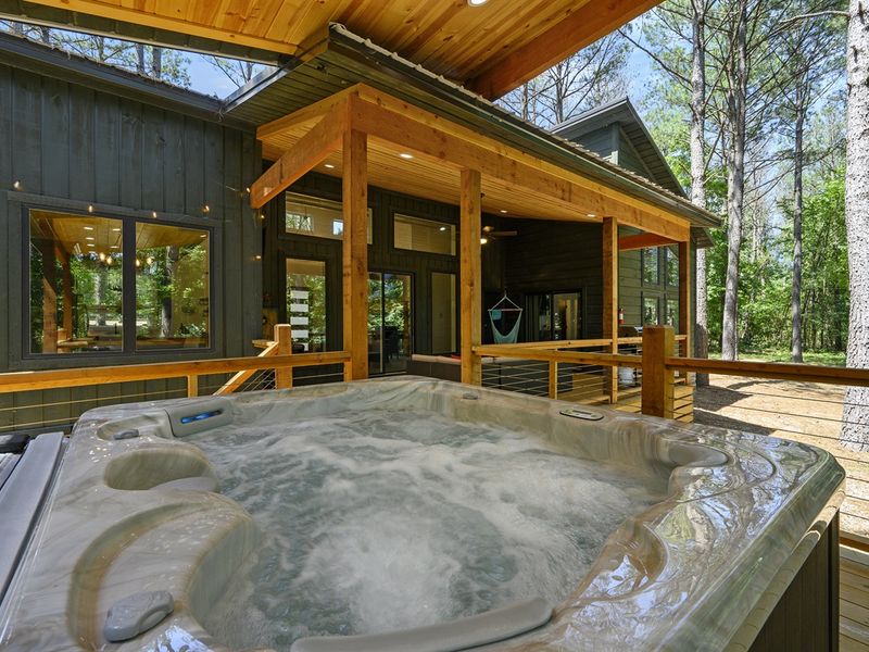 Dive into adventure and tranquility with our forest-nestled hot tub retreat, ready to soothe and inspire.
