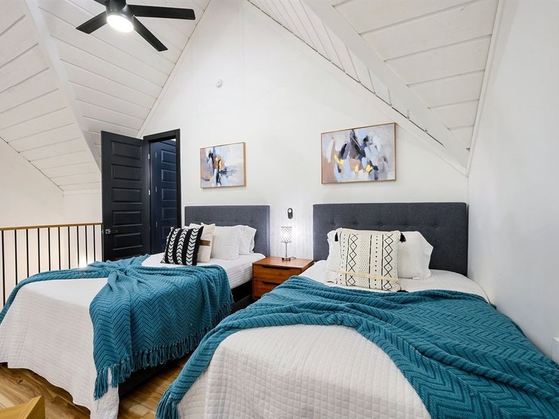 Game room by day, cozy sleeping space by night