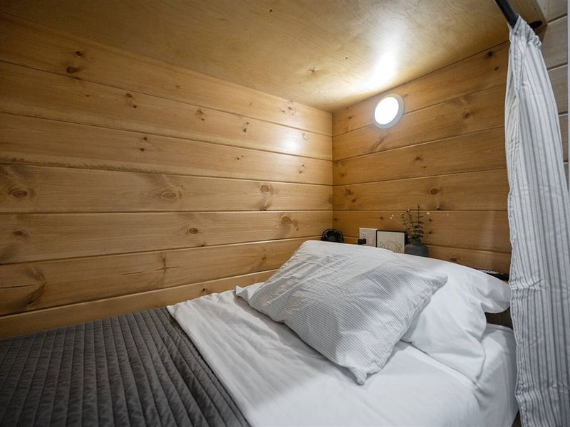 Cozy bunk nook with hybrid inner spring + memory foam mattress and luxury linens