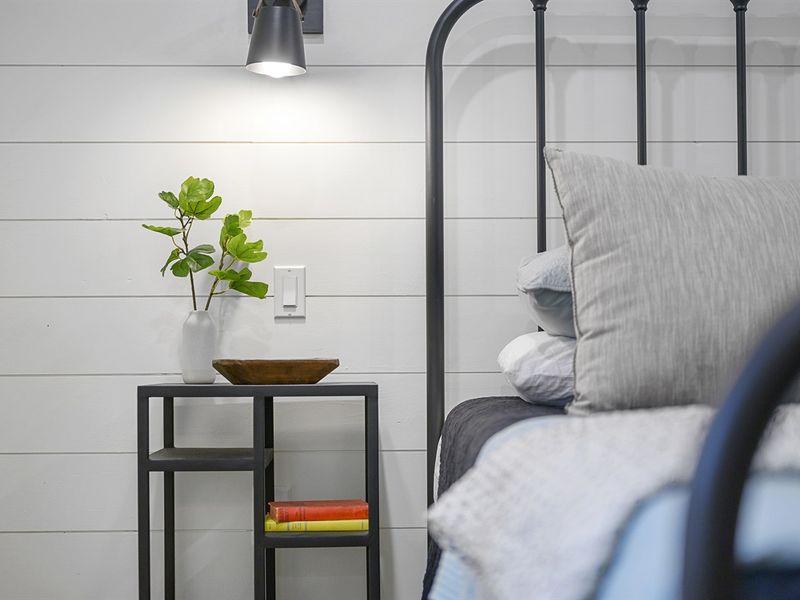 Your ticket to a good night's sleep lies in this inviting bedroom setup.