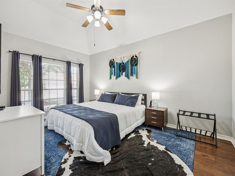 Cozy king bed with crisp, comfortable linens.