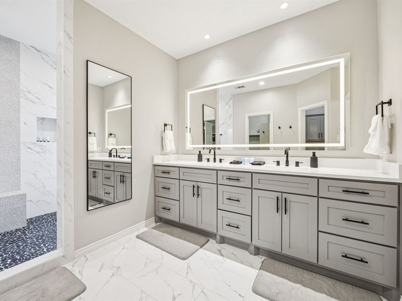 Dual vanities make morning and evening routines a breeze.