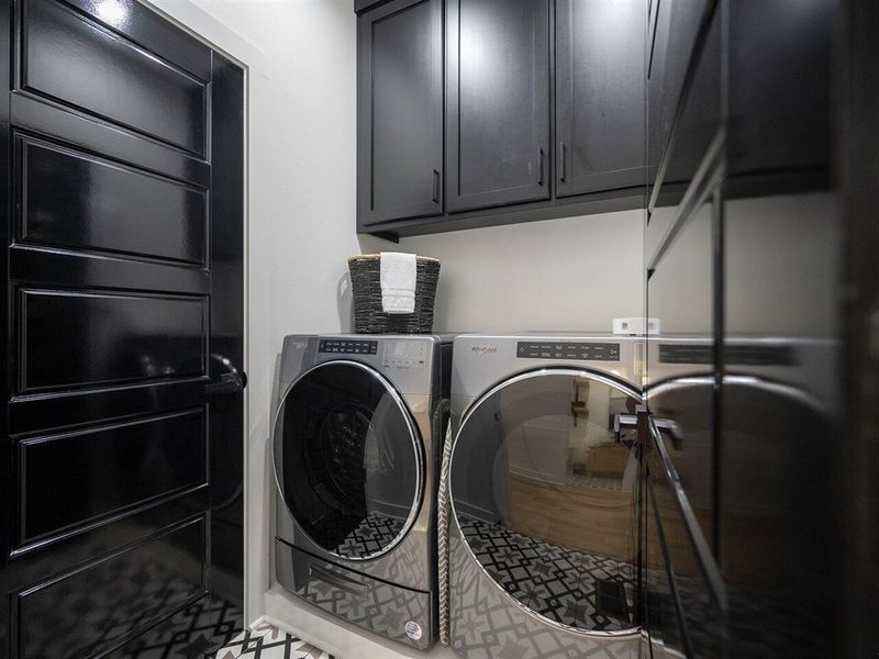 Laundry room with washer and dryer