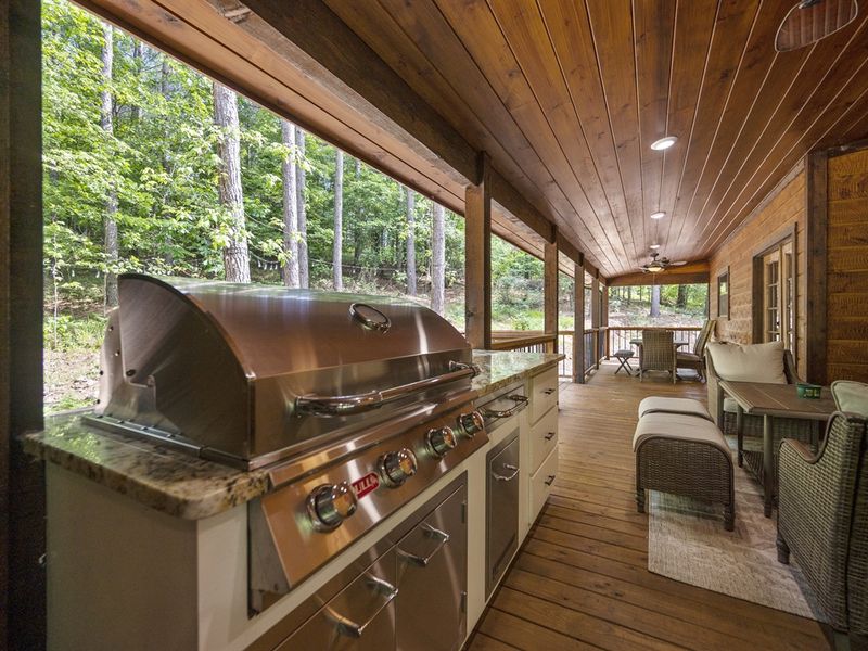 "Sizzle and grill to the heart's content with our state-of-the-art outdoor kitchen."
