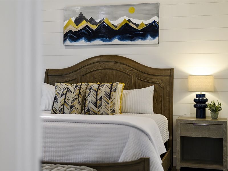 Comfortable bedding and extra pillows to create a dreamy night's sleep