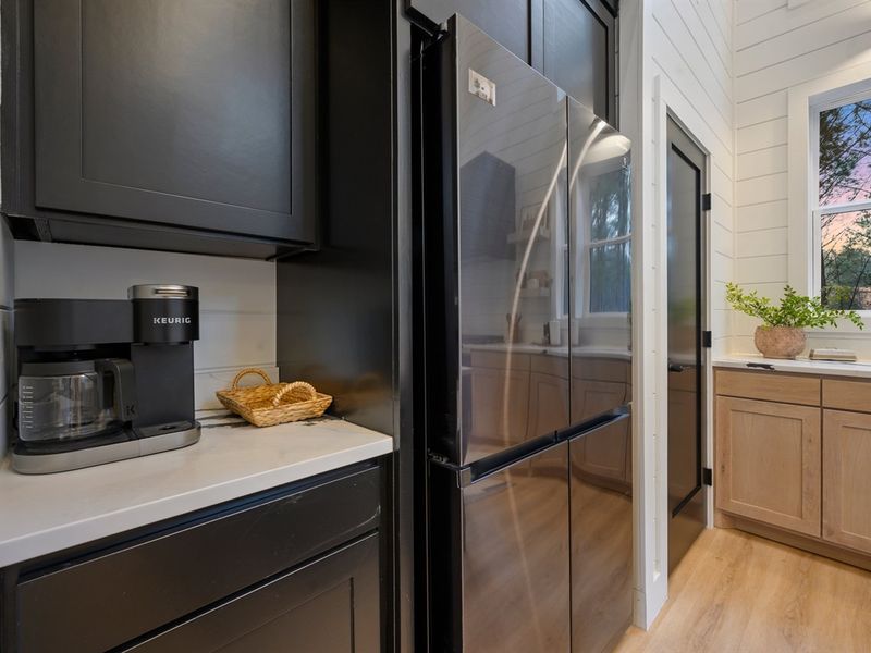 Thoughtfully designed open shelving and clean lines create a bright, airy, and inviting space.