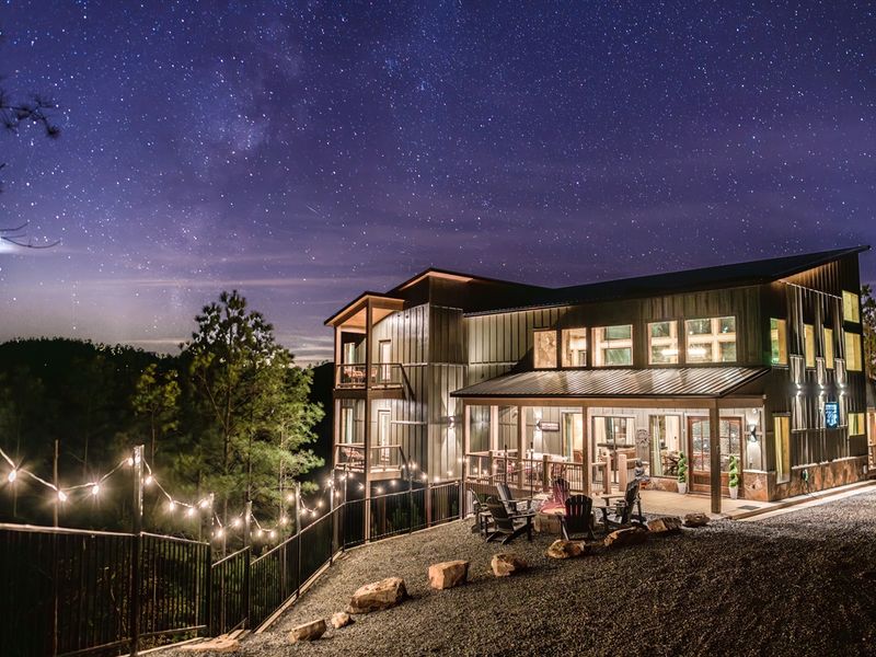 Cozy cabin vibes under a galaxy of stars - your perfect night escape awaits!