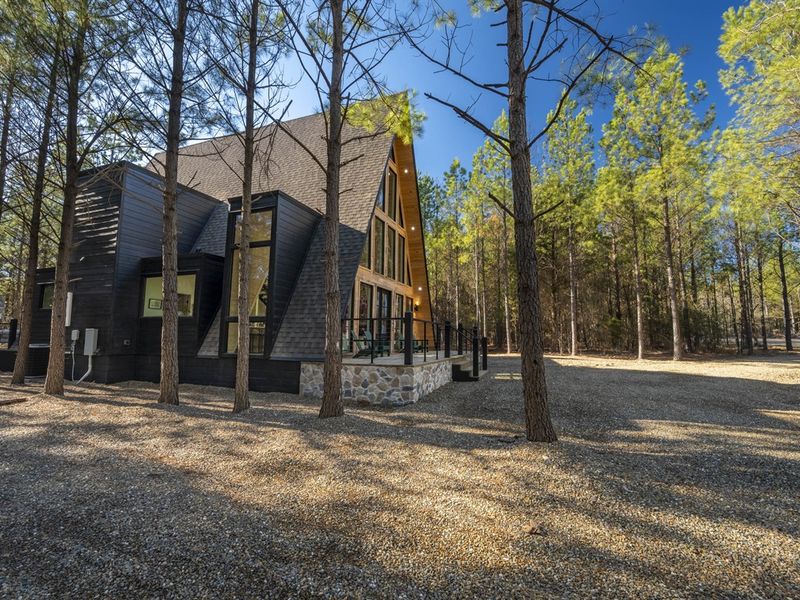 "Where every detail tells a story: From gravel paths to dark, chic panels."