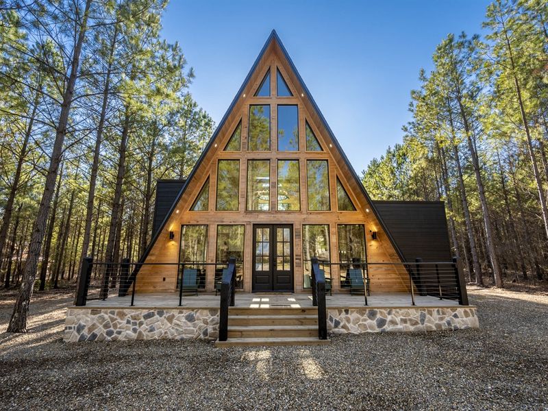 "Step into a world of rustic warmth and modern elegance, welcomed by inviting double doors."