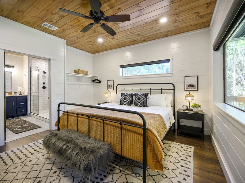 "Unwind in style with plush pillows and modern luxury linens on our sumptuous king-size Helix mattress."