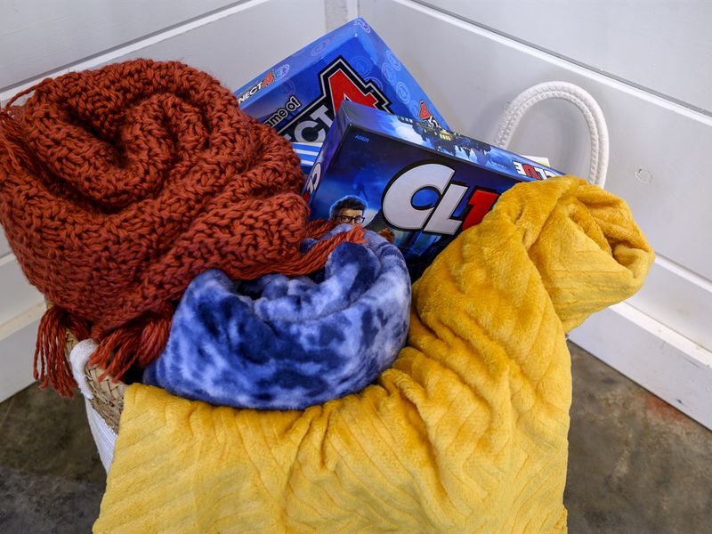 Extra blankets to snuggle and games for all ages
