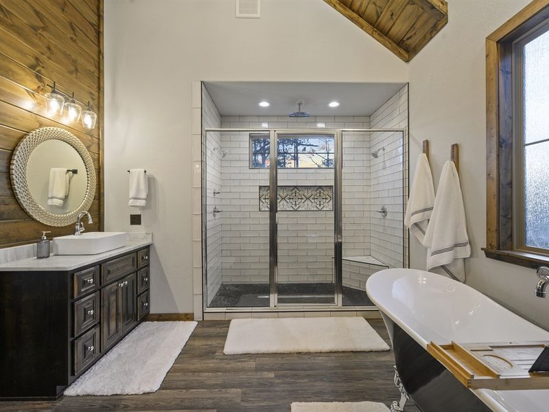 Nice large walk-in shower, vanity and tub