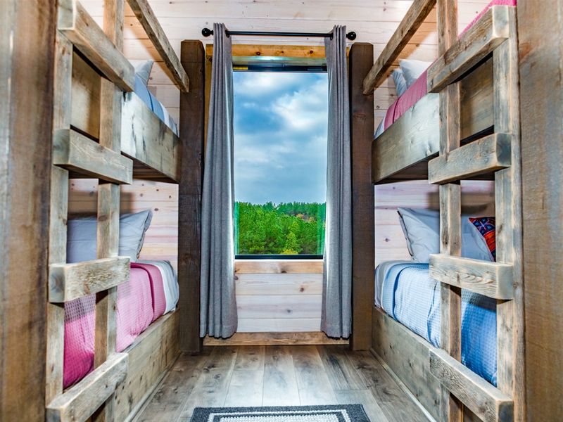 Nature views paired with cozy bunks - perfection for everyone.