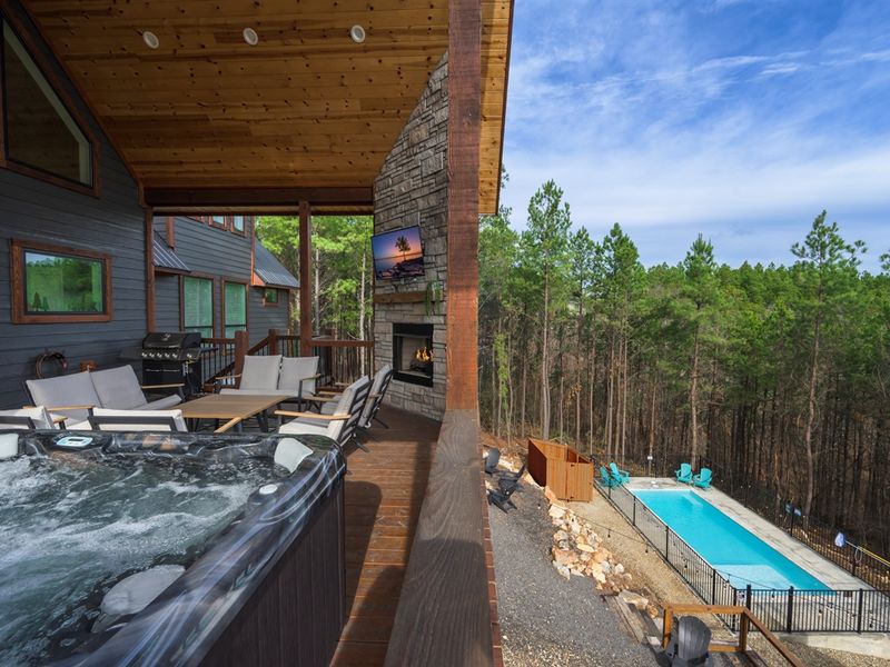 Soak above the trees while your private pool sparkles below
