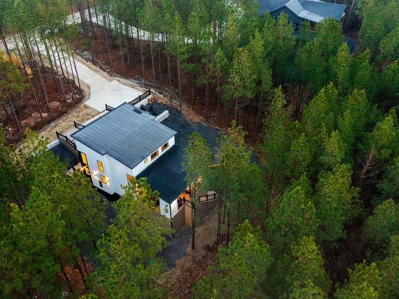 Tucked among towering pines, this modern cabin offers the ultimate private retreat.