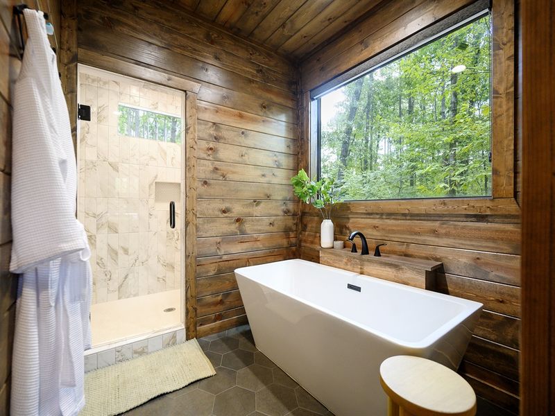 Grab a book or glass of wine as you relax in the freestanding soaker tub
