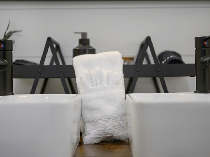 Freshen up your day with a crisp white towel waiting to pamper you after a relaxing shower!