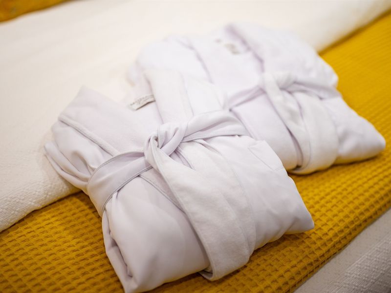 "His & Hers" Spa bathrobes provided