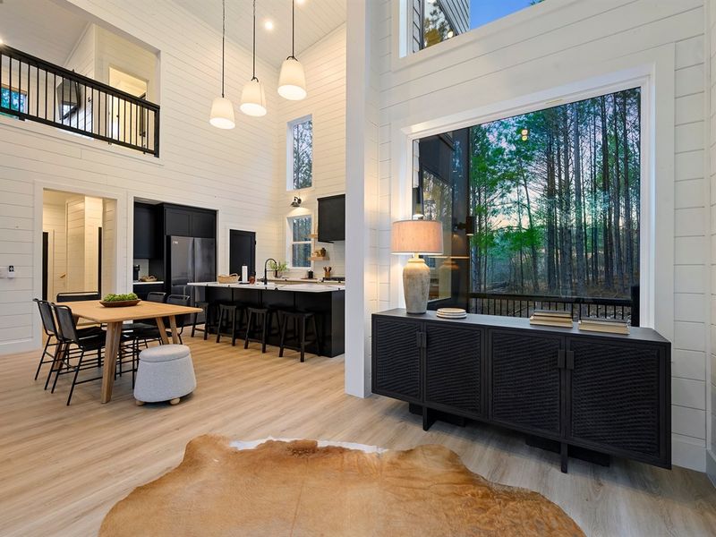 Large picture windows bring the outdoors in, offering peaceful woodland views while you cook.