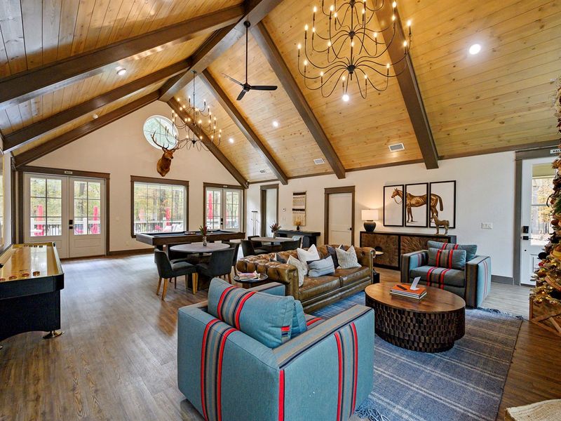 Your home base for fun and relaxation — unwind by the fire, challenge friends to a game, and enjoy this stunning lodge-style clubhouse