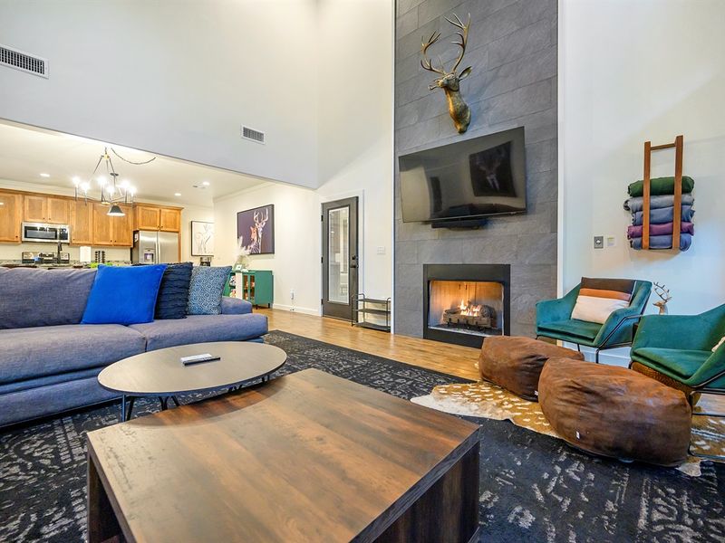 Curl up by the fire in style — modern design, plush seating, and cozy details that make this living room feel like pure mountain luxury