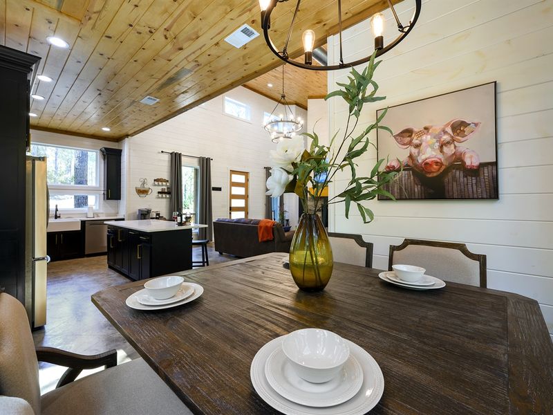 Discover serene dining at home, where modern meets cozy comfort.