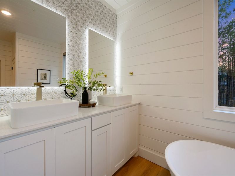 Soft lighting and elegant finishes create a bright, serene atmosphere.