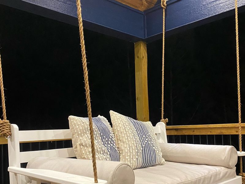 "Unwind and soak in the tranquility of nature on our twin-size porch swing bed."