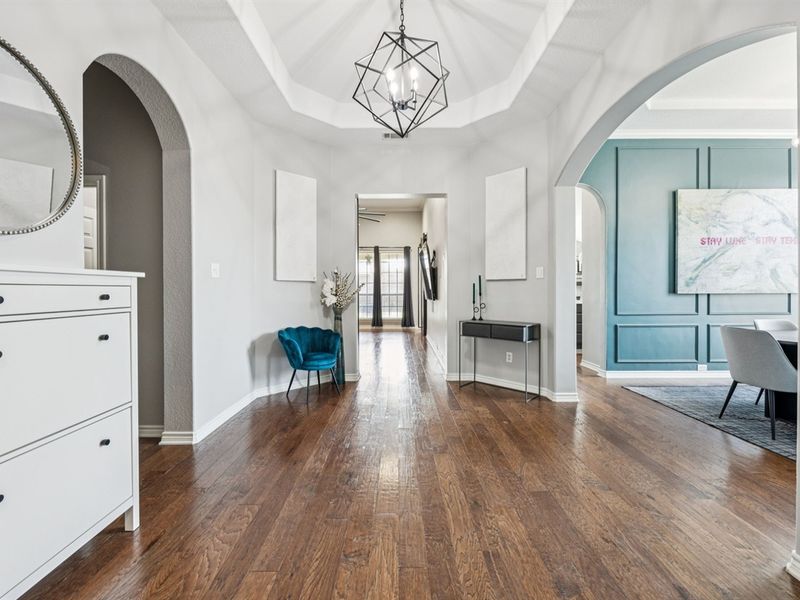 Welcoming foyer with open sightlines into the heart of the home.