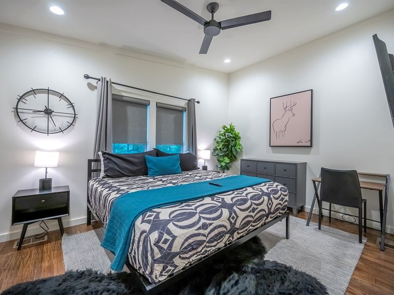 Sleep soundly in the spacious upstairs king bed — plush comfort and peaceful forest views await. 🌲🛏️