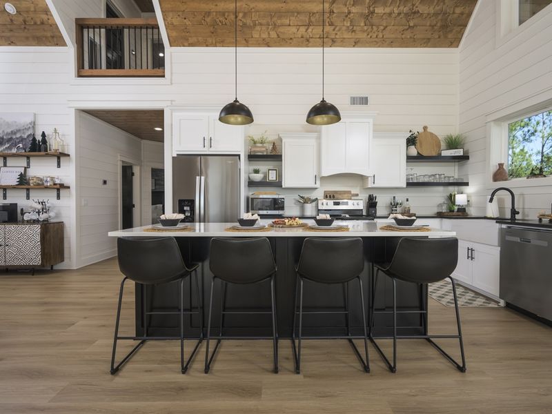 The main level features a gourmet kitchen, perfect for cooking delicious meals and creating lasting memories.  (Fully Equipped)