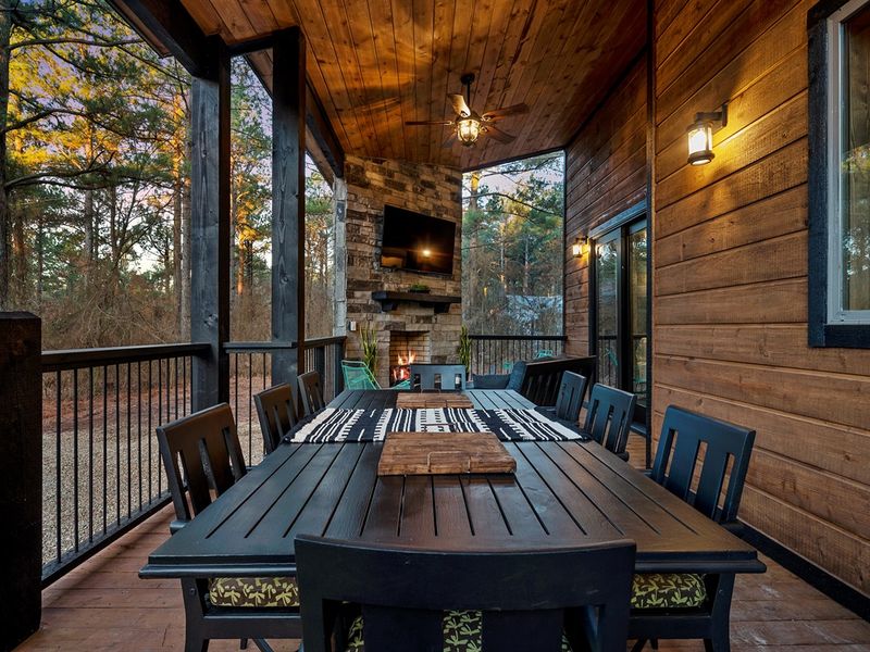 Enjoy meals together outdoors with spacious seating for eight under the open sky.