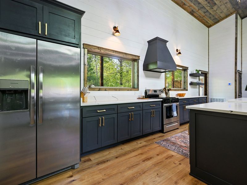 Indulge in Culinary Bliss: Chef's delight kitchen with stainless steel appliances and ample counter space