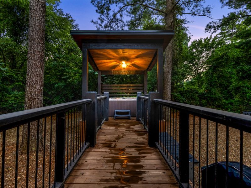 Arrive with ease along the well-lit, sturdy walkway leading to the cabin.