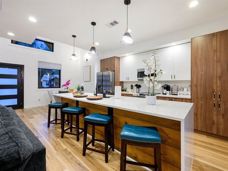 A bright, open kitchen made for gathering, cooking, and lingering conversations.