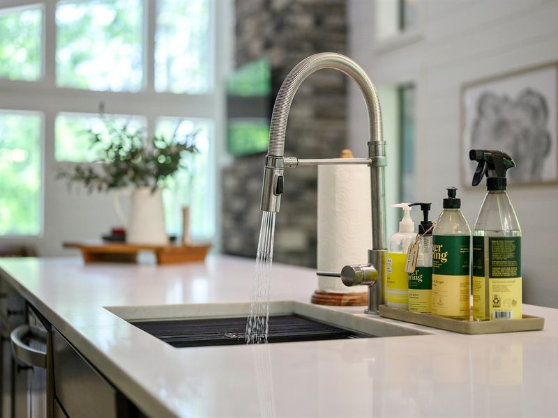 Feeling those modern kitchen vibes with this stunning stainless steel sink and faucet combo. Who says washing dishes can't be stylish?