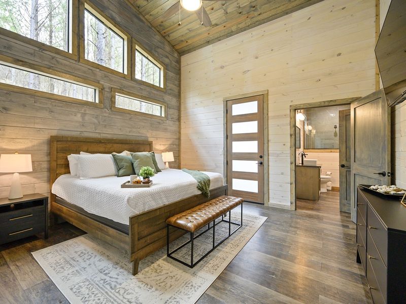 Nestled in the heart of nature, our cozy cabin invites you to unwind in these inviting beds surrounded by the peaceful serenity of the woods.