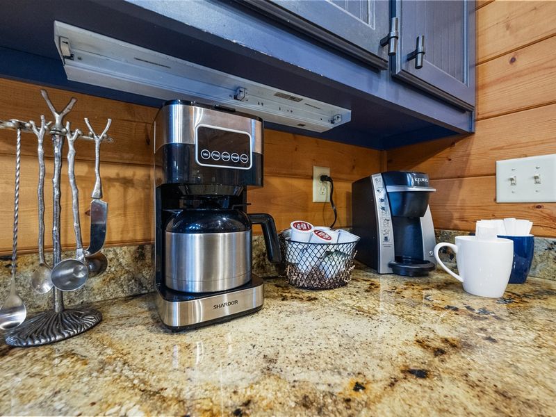 Coffee lovers rejoice! With a modern coffee pot and an array of pods, your caffeine fix is always just a brew away in this cozy cabin.