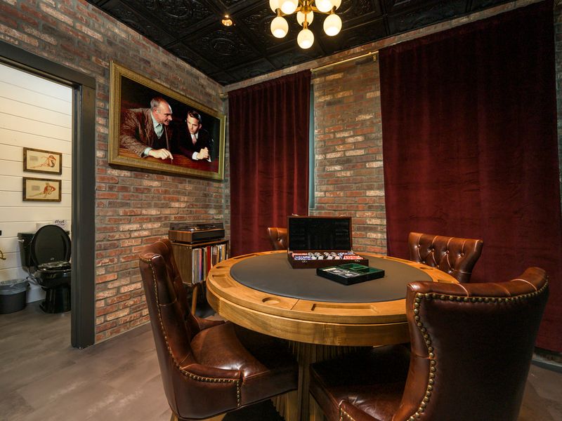 Gather around the poker table for a friendly game of cards in this beautifully appointed speakeasy.