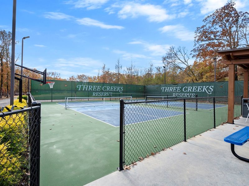 Fresh air, tall trees, and a full sports court just steps from the clubhouse