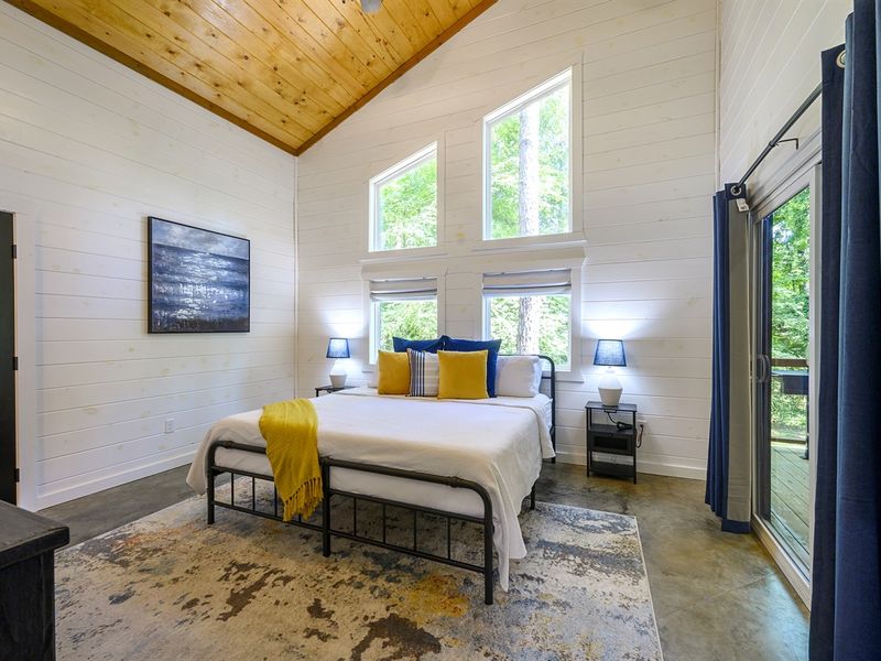 "Rejuvenate in the primary bedroom's king-size bed and luxurious en-suite bathroom."