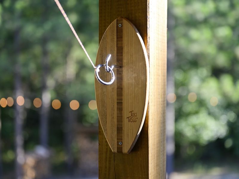 "Embrace outdoor fun with activities like cornhole and Tiki Toss on our deck."