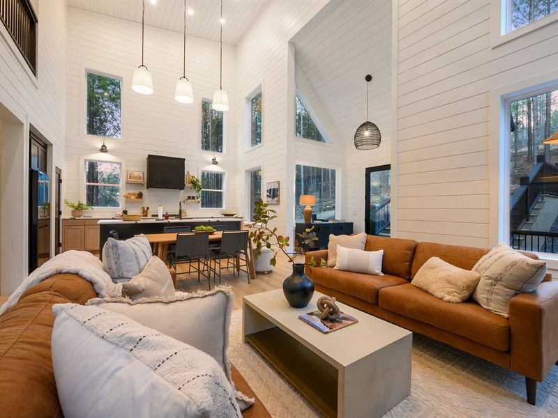 The open-concept living, dining, and kitchen area is perfect for relaxing and reconnecting.