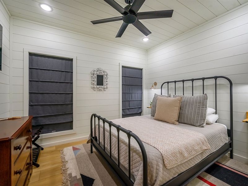 Dreamy bedroom vibes with a cozy bed and a calming ceiling fan for the ultimate relaxation spot.