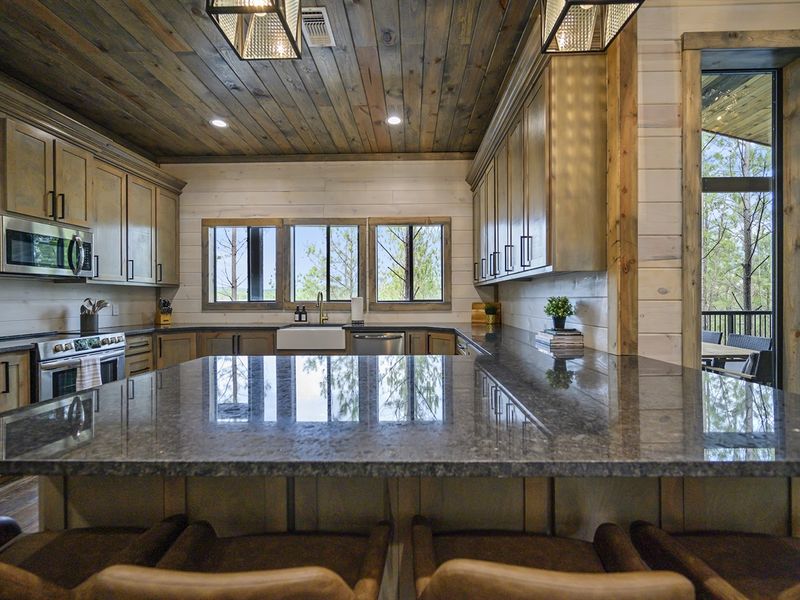 From morning coffee to evening dinners, create unforgettable memories in this picturesque kitchen