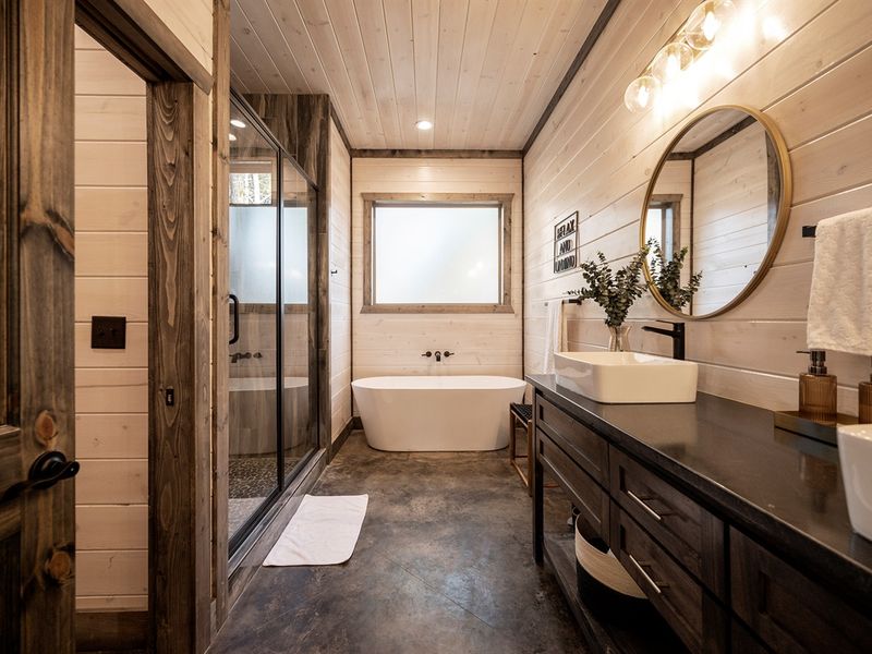 Unwind in the private ensuite featuring a relaxing soaking tub
