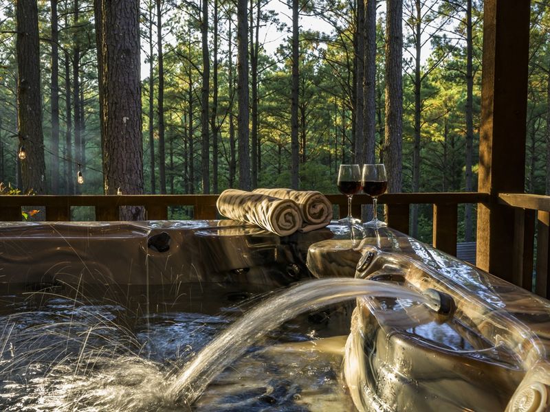 Soak in serenity: The outdoor hot tub&ndash; your oasis among the pines.
