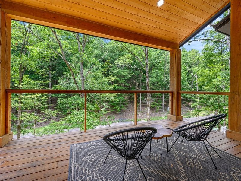 The perfect spot for a morning coffee with a breathtaking view of the lush forest ahead.