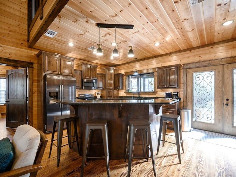 You'll enjoy preparing meals and beverages in this spacious, open kitchen
